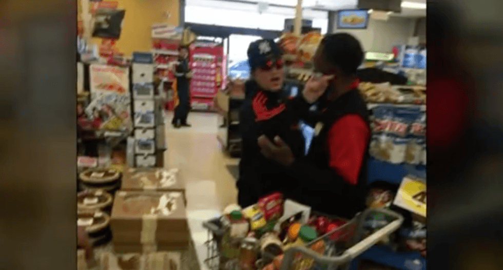 Shoppers band together to defend a woman wearing a hijab against a verbal assaulter