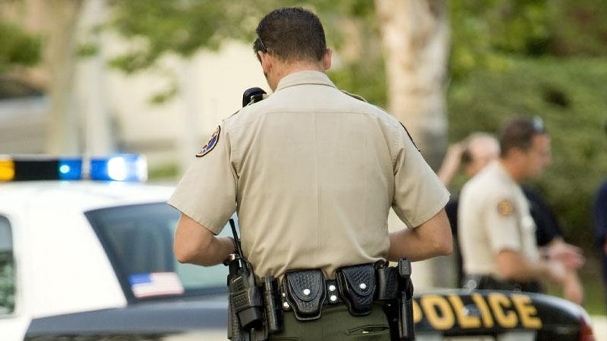 Domestic violence probe reveals Kansas cops joking about 'hunting' minorities in racist texts: report
