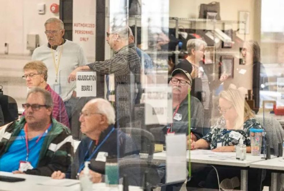 Man who called for mass shooting of poll workers and threatened kids of Arizona election officials sentenced