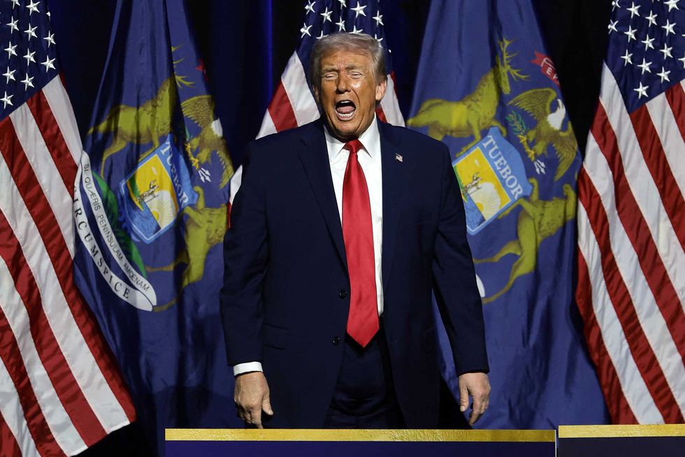 Trump gives middle finger to worker shouting 'pedophile protector'