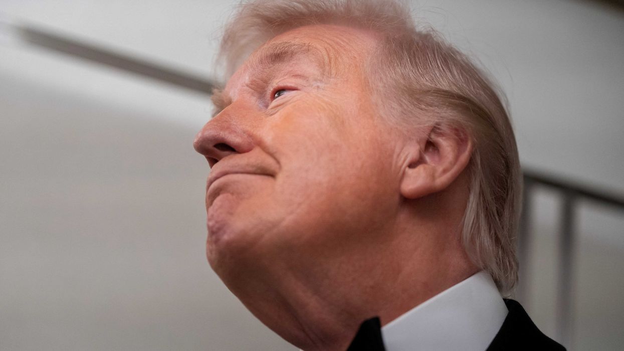 Trump backs down on dispute with ally while threatening to take another land mass by force