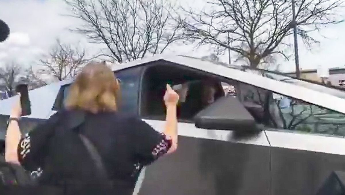 Elon Musk calls for 'arrests' after woman points her finger at a Cybertruck