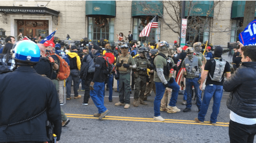 'Anybody got a bazooka?' Proud Boys wreak havoc on DC as Mike Flynn and others rally Donald Trump loyalists