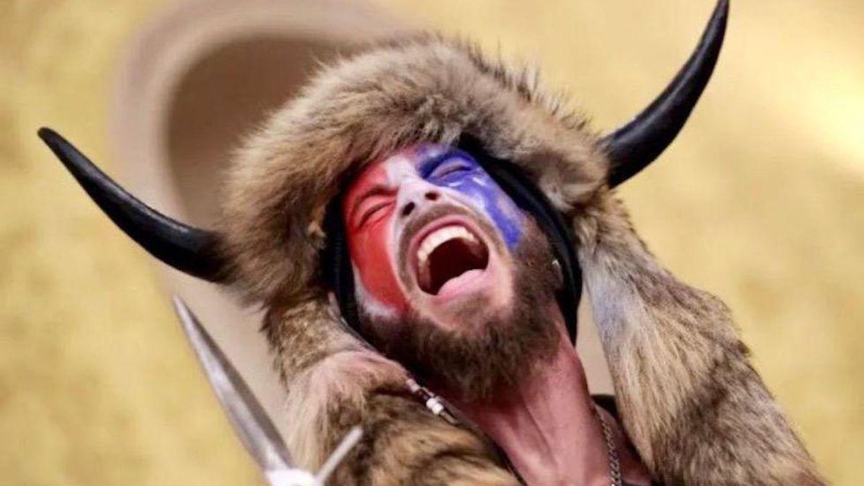 Justice Department wants to put the so-called 'QAnon Shaman' behind bars for 4 years