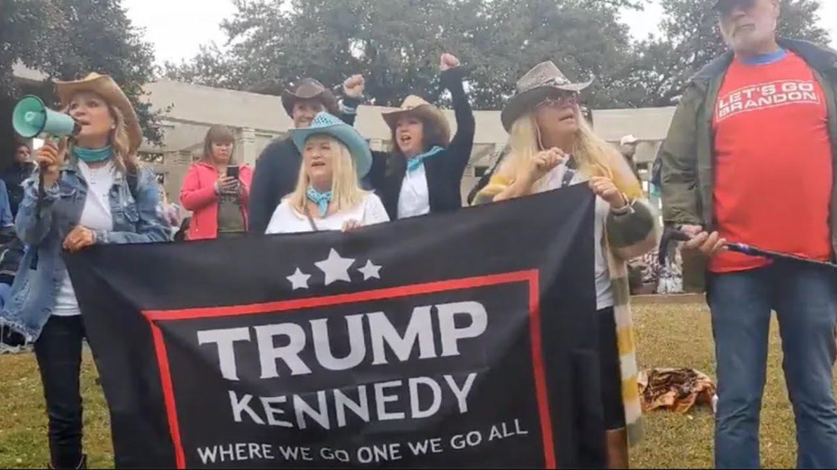WATCH: QAnon supporters chant ‘Let’s Go Brandon’ while holding ‘Trump-Kennedy’ banner