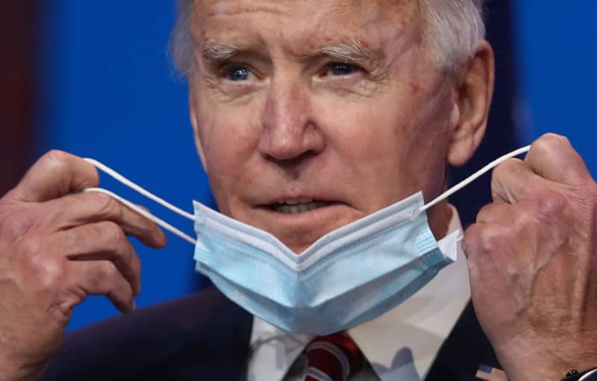 Biden orders masks, travel clampdown in new war on Covid