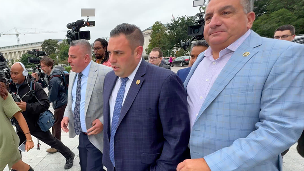 Watch: GOP lawmaker flees as reporters pelt him with questions about alleged mistress