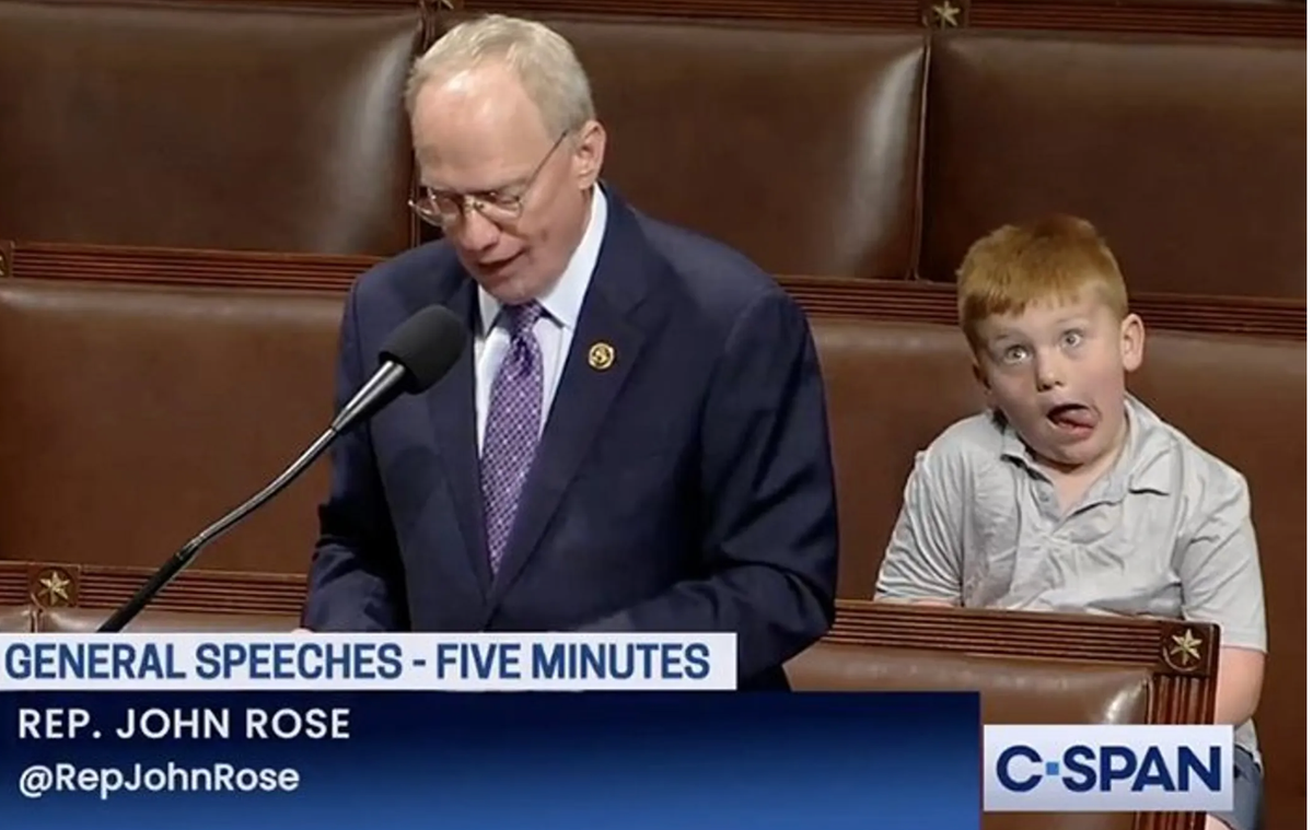 'How we're all feeling': Kid makes funny faces behind GOP lawmaker during pro-Trump speech