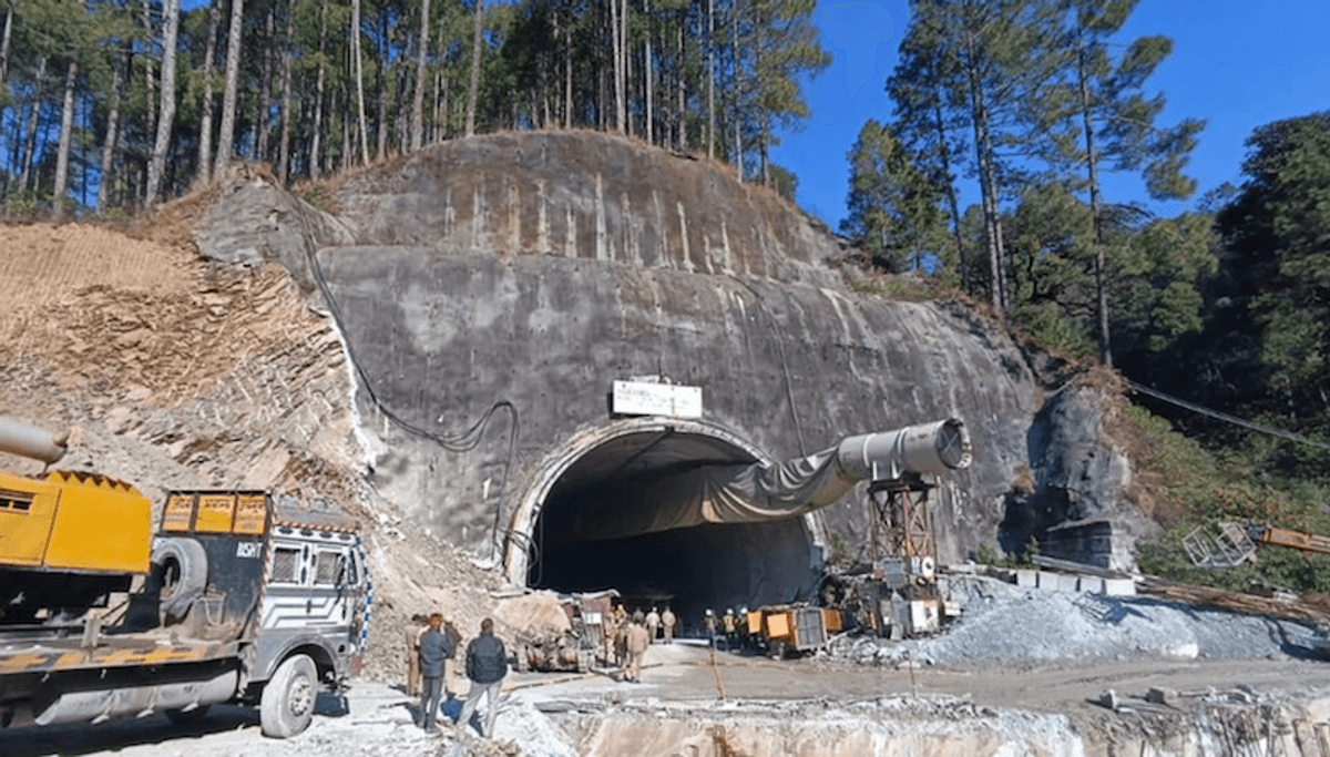 Indian rescuers battle to save 40 workers trapped in collapsed tunnel