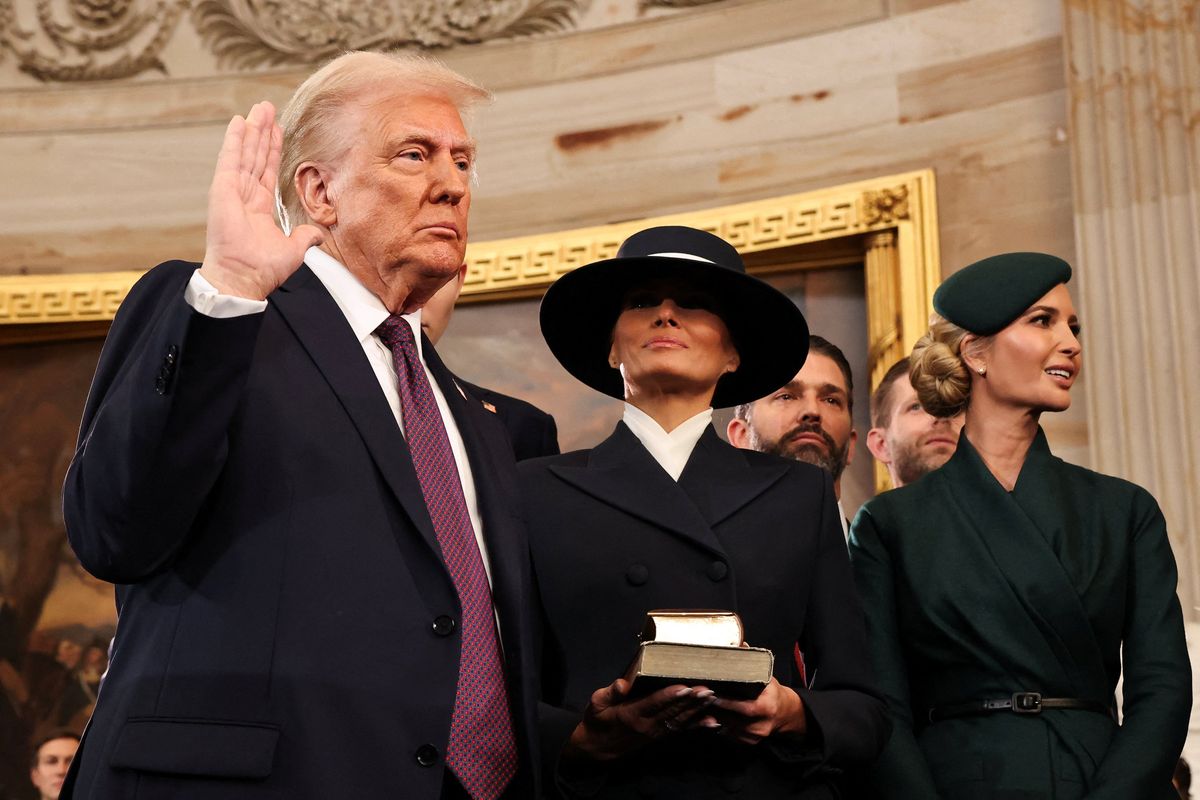'Saved by God' Trump mocked for not placing hand on Bible during oath