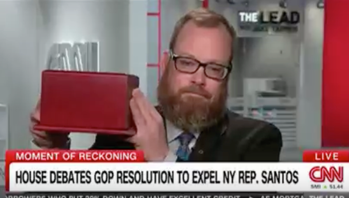 Disabled vet holds up dead dog's ashes as he begs GOP to expel George Santos