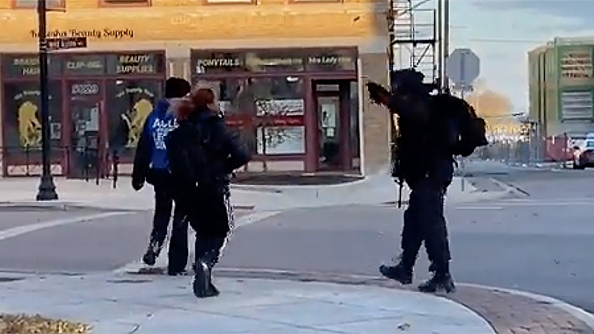 Rifles reappear to protest Kenosha verdict — but these are to protect marchers from those like Rittenhouse