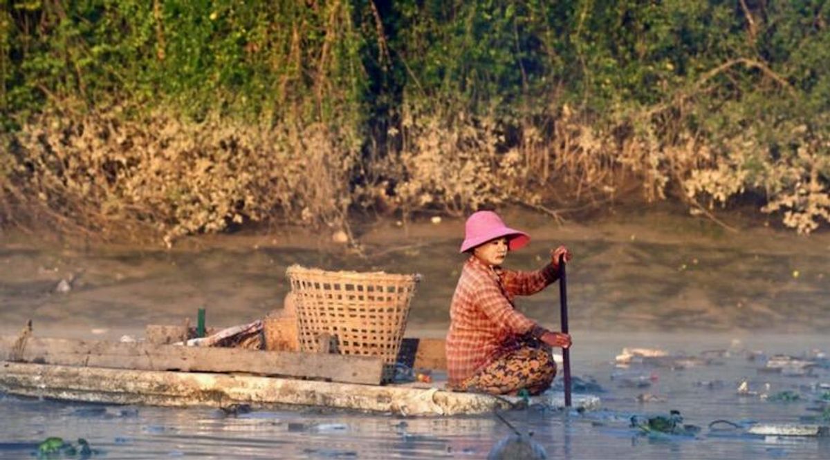 On the water with Myanmar's 'river cleaners'