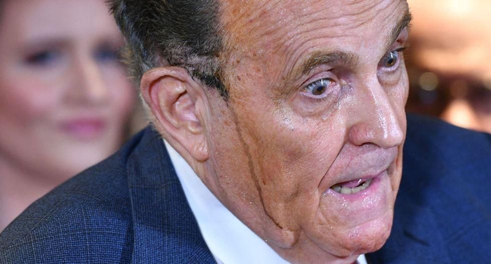 'No, this isn't happening': Trump aides looked on in horror as Giuliani's hair dye streamed down his face