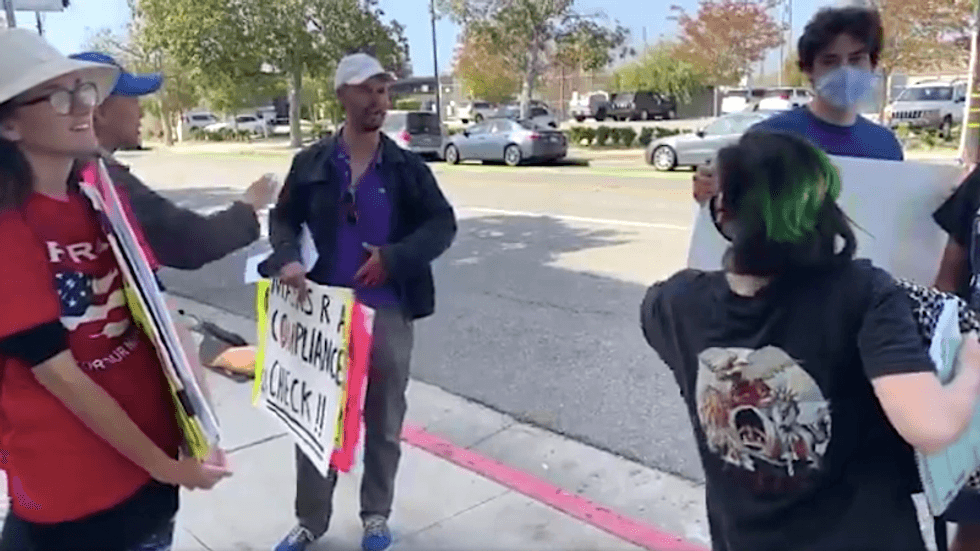 WATCH: ‘Creepy’ anti-maskers get brutally mocked as they protest outside California school