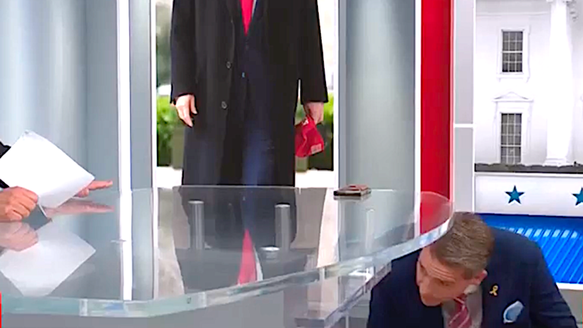 Watch: CNN Republican Scott Jennings ducks under table to avoid crashing stock ticker