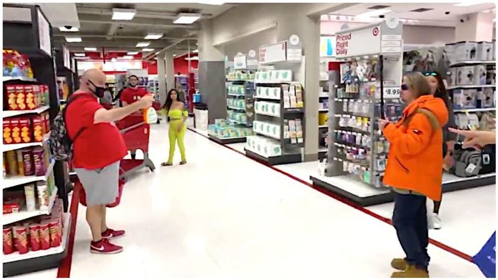 WATCH: Anti-maskers invade another mall – but this time they get sprayed with cleaning solution