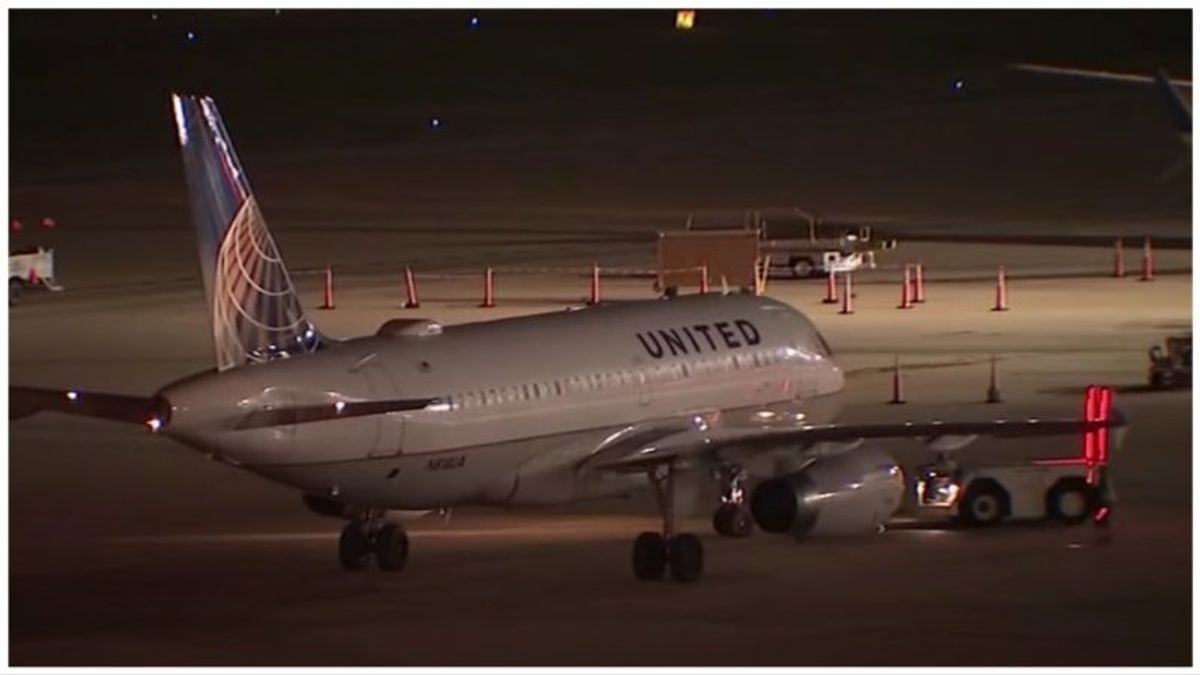 United Airlines passenger punches attendant and tries to leap from emergency exit: report