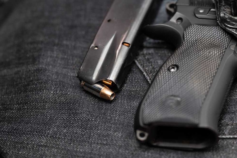 Influencer couple says death threats over abortion drove them to keep a gun by their bed
