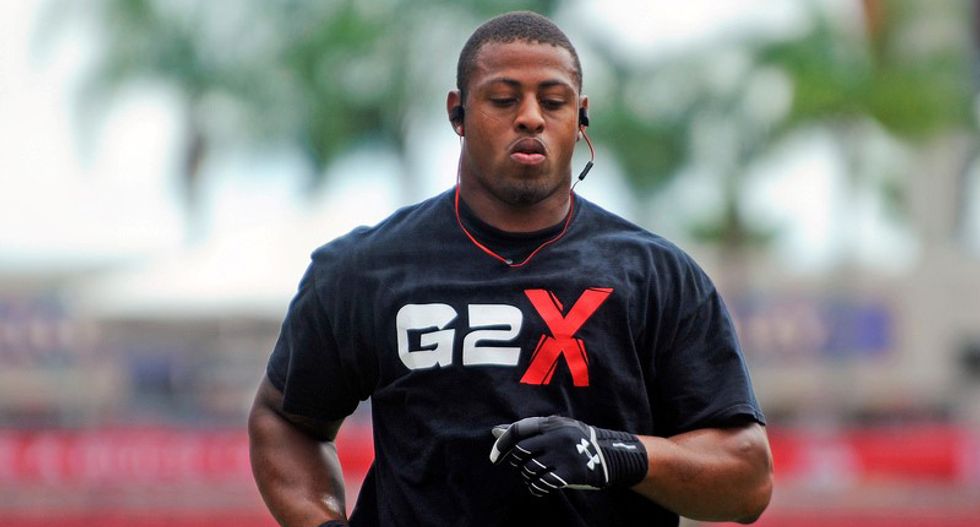 Bowing to pressure, NFL Carolina Panthers deactivate Hardy over assault conviction