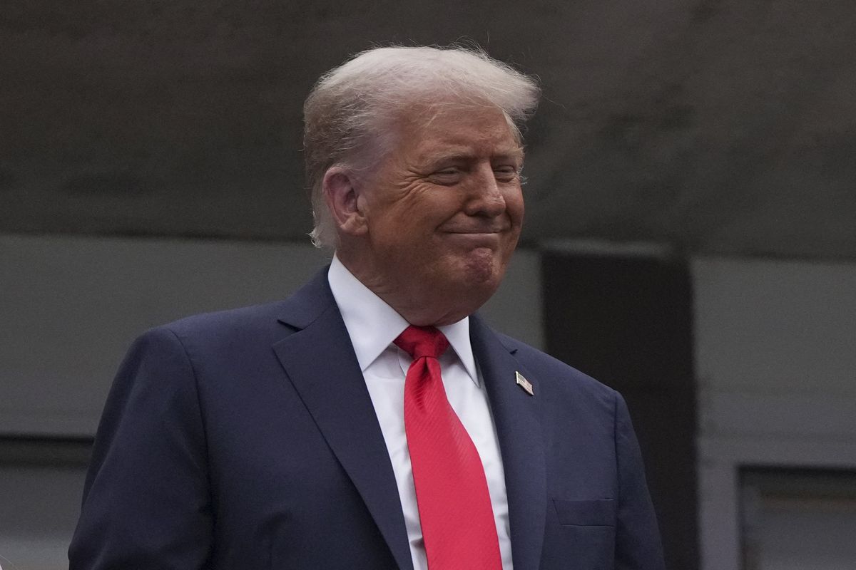 Mystery blue object between Trump's teeth sparks questions — and mockery: 'Meds or mint?'