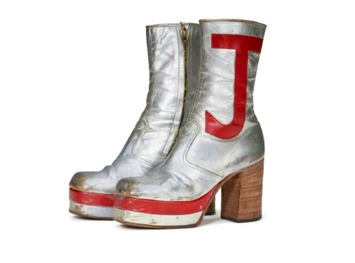 Elton John items fetch $8 million at New York auction