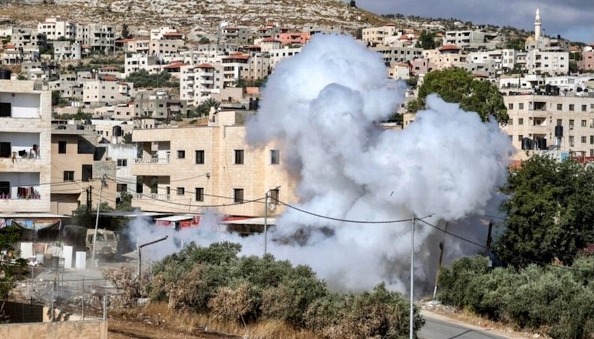 Israeli helicopters fire missiles in massive West Bank gunbattle