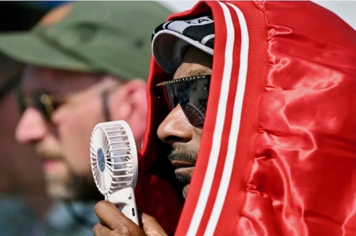 Snoop Dogg wows crowd at sizzling Olympic beach volleyball venue