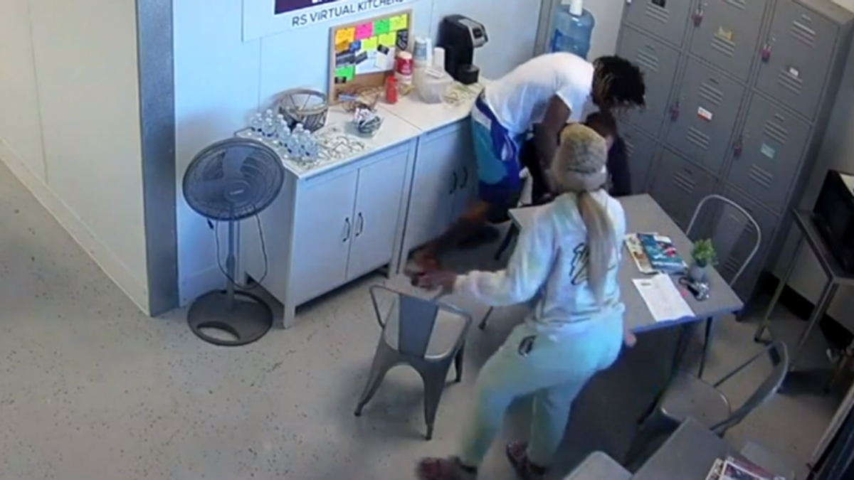 WATCH: Black food truck owners subdue businessman after he pulls a gun on them during exit interview