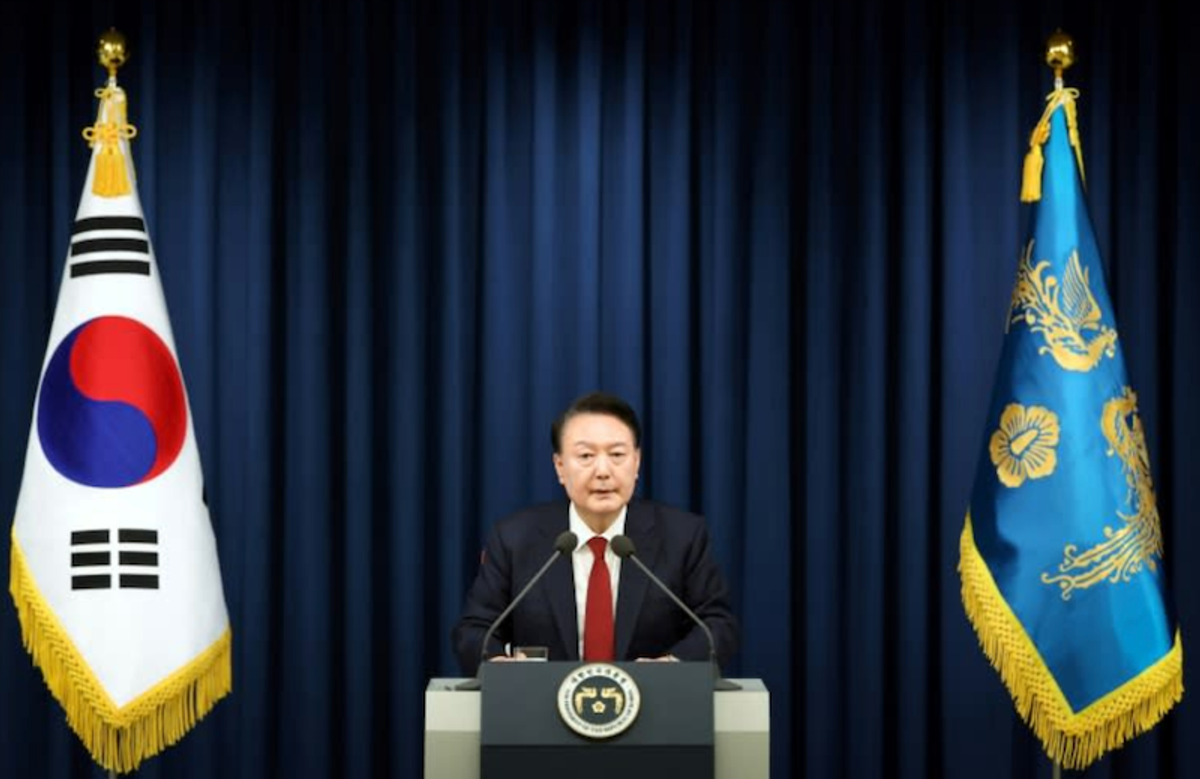 South Korea investigators seek arrest of impeached president over no-show