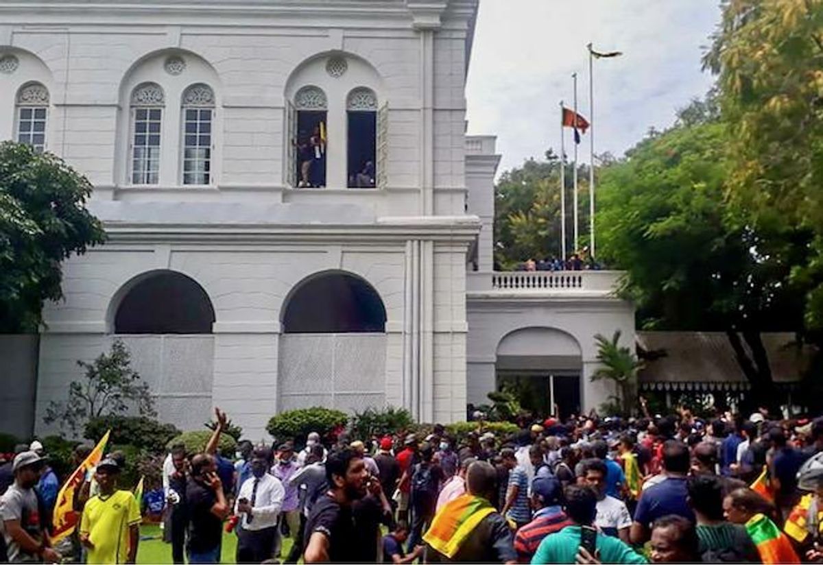 Sri Lanka leader flees as protesters storm home