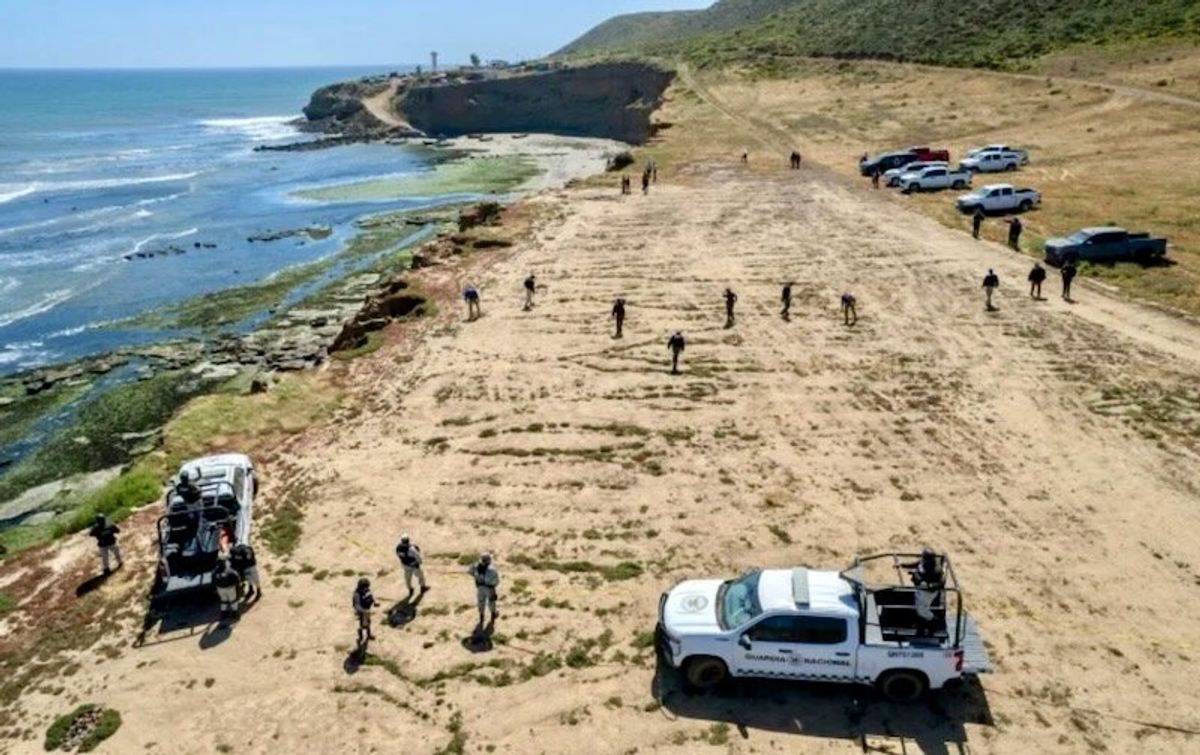 Slain Australian surfers' bodies arrive in U.S. on journey home