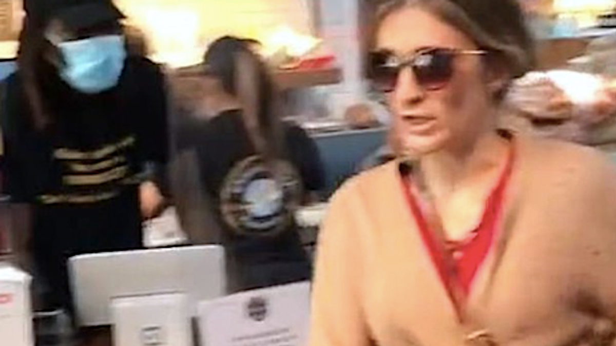 Trump-loving woman has racist meltdown over mask request: 'It's a hoax to steal the election!'