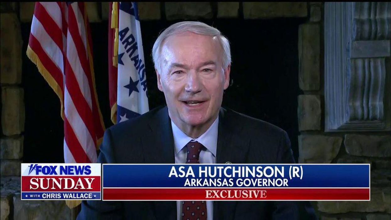 Arkansas GOP governor signs 'illegal' anti-transgender bill into law: report