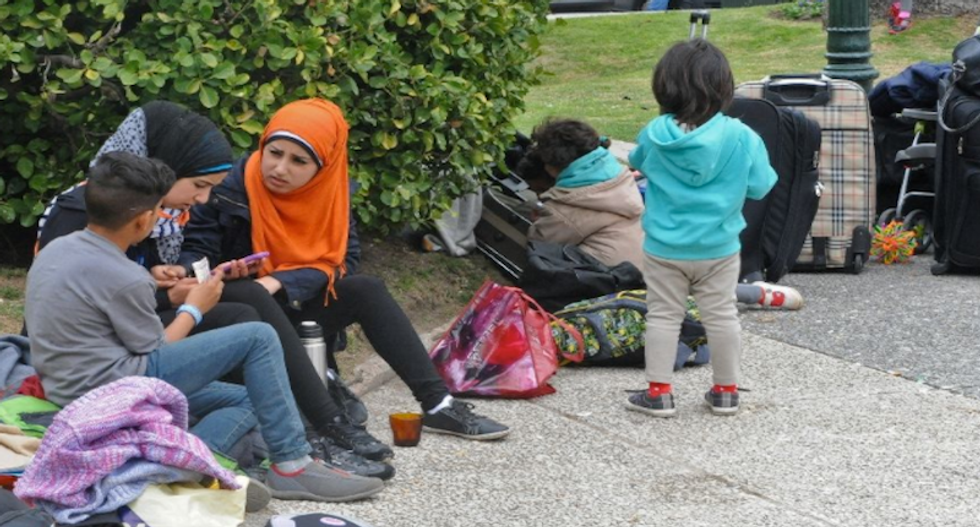 'I'll hide you in my basement': Missouri neighborhood vows to protect refugee family from Trump