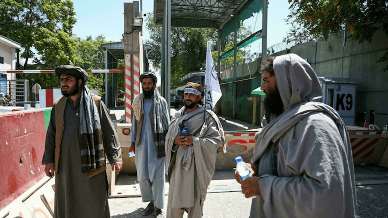 One killed in Kabul firefight as Taliban warn of 'consequences' if US extends evacuation