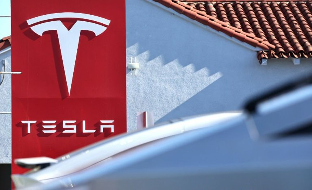 Tesla results miss estimates, citing lower vehicle prices