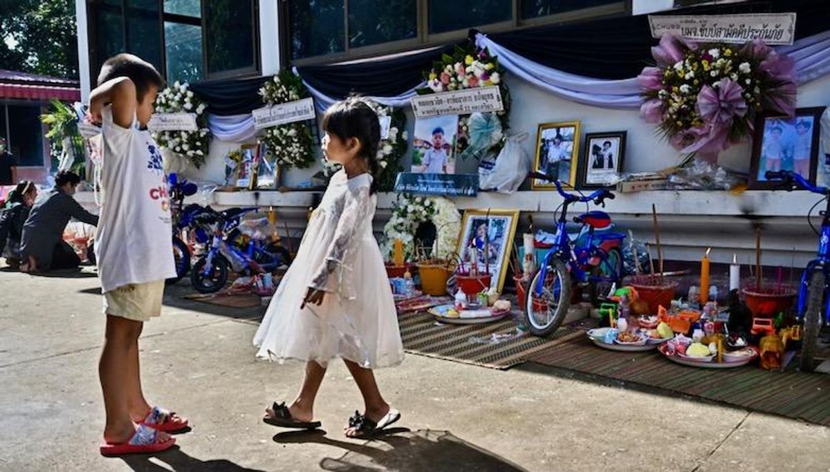 Families gather for mass cremation of Thai nursery victims