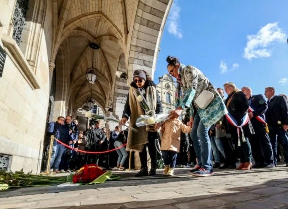 France hails murdered teacher as Macron urges 'ruthless' response