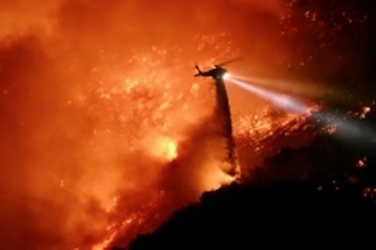 Death toll from Los Angeles fires rises, with dangerous winds incoming