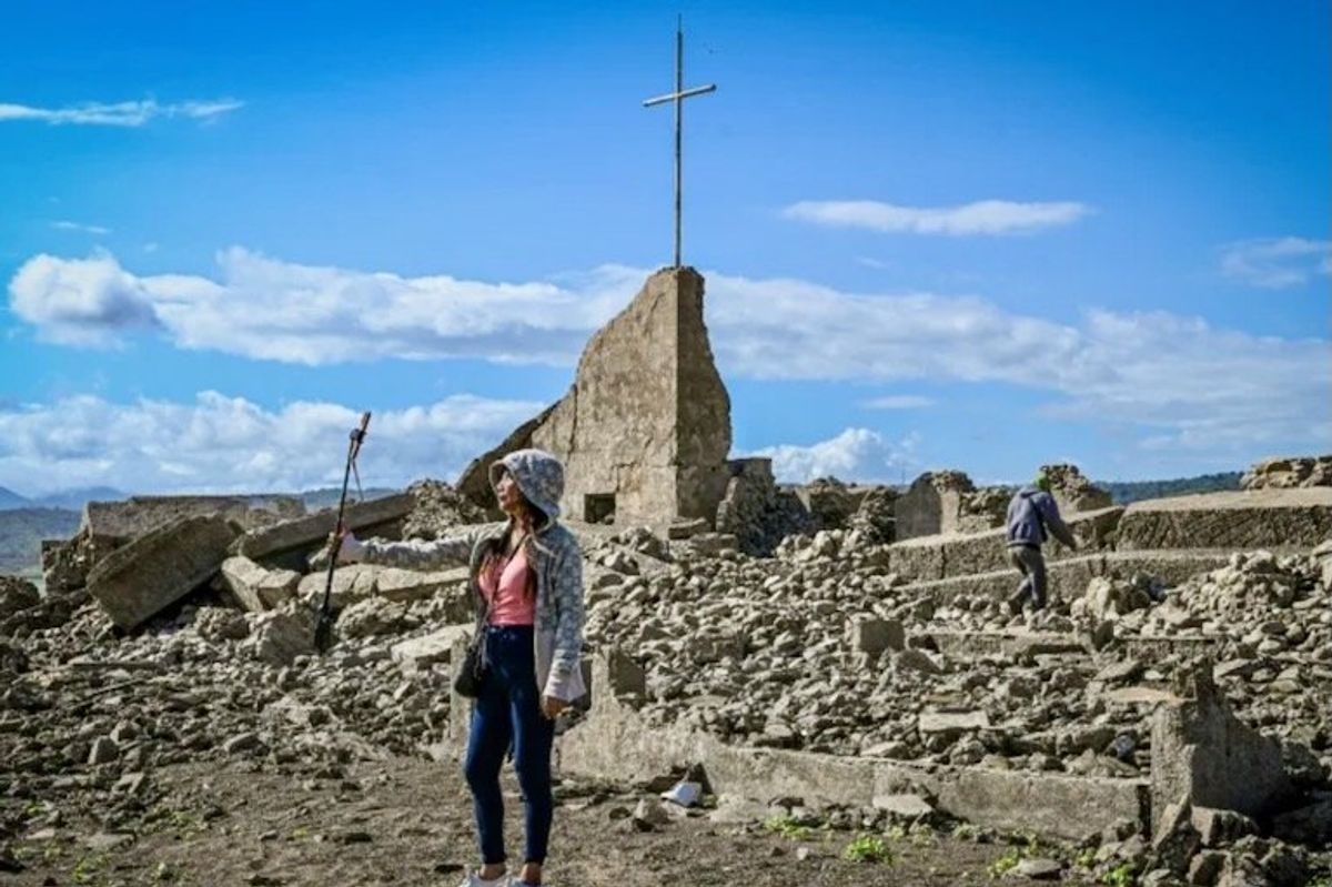 Philippine settlement submerged by dam reappears due to drought