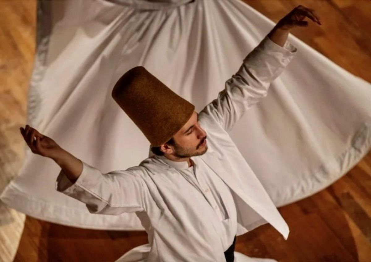 'Tombstone' hats remind whirling dervishes of their death