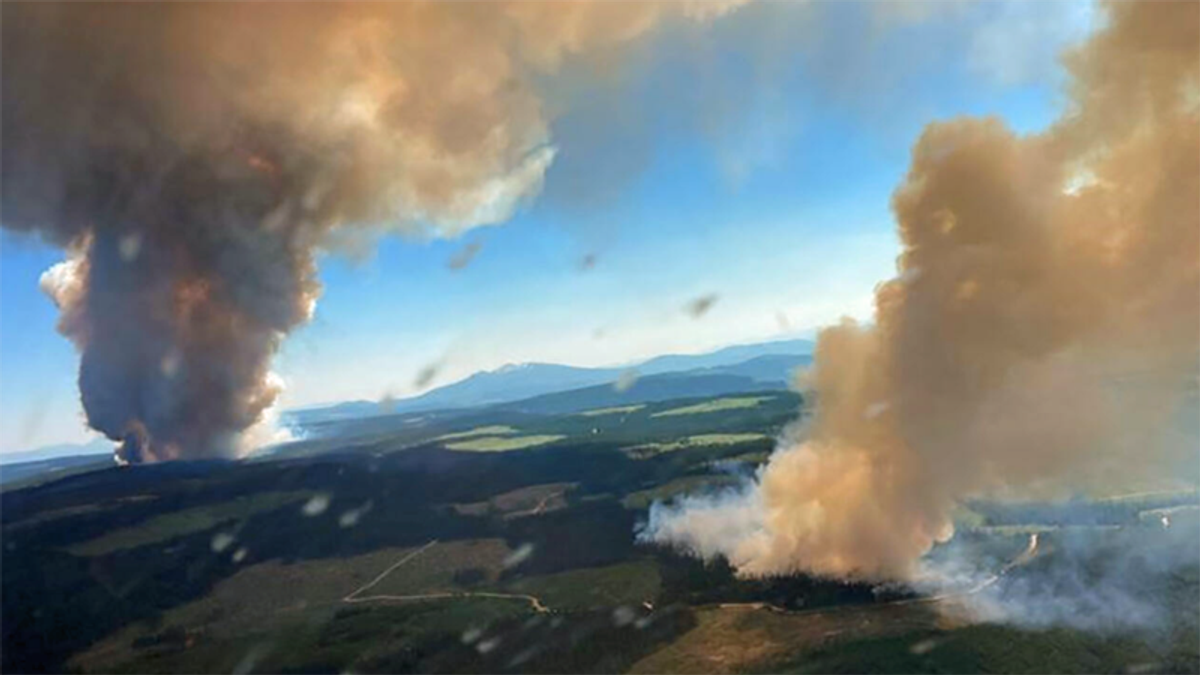 Canadian military prepares to evacuate fire-threatened towns during record-smashing heat wave