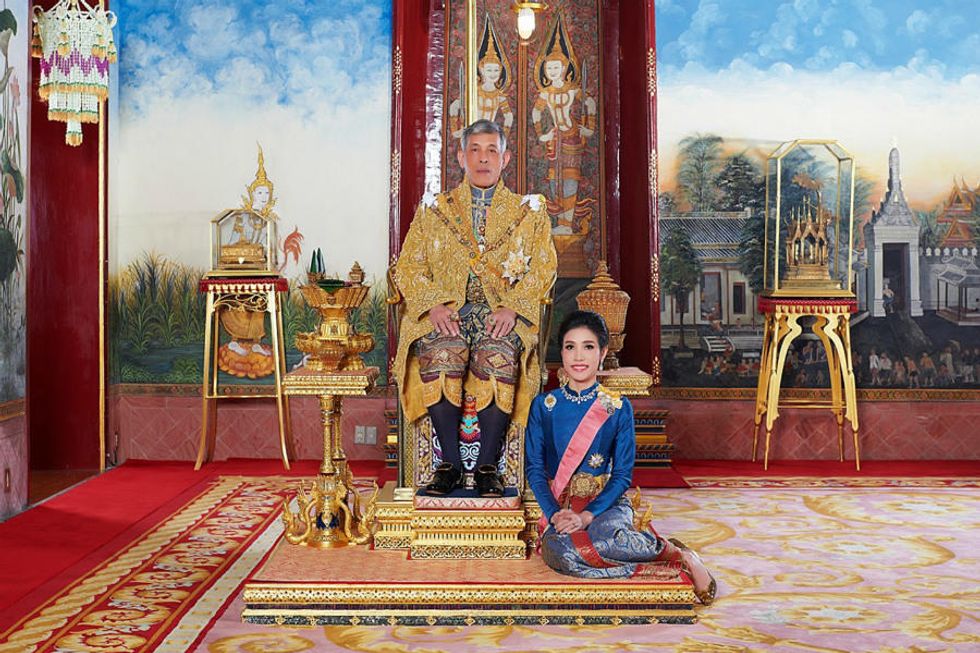 This undated handout from Thailand's Royal Office received on August 26, 2019 shows Thailand's King Maha Vajiralongkorn posing with royal noble consort Sineenat Bilaskalayani, also known as Sineenat Wongvajirapakdi.