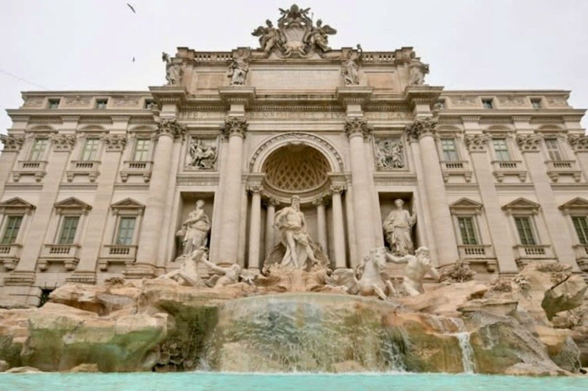 Rome's Trevi Fountain reopens to limited crowds
