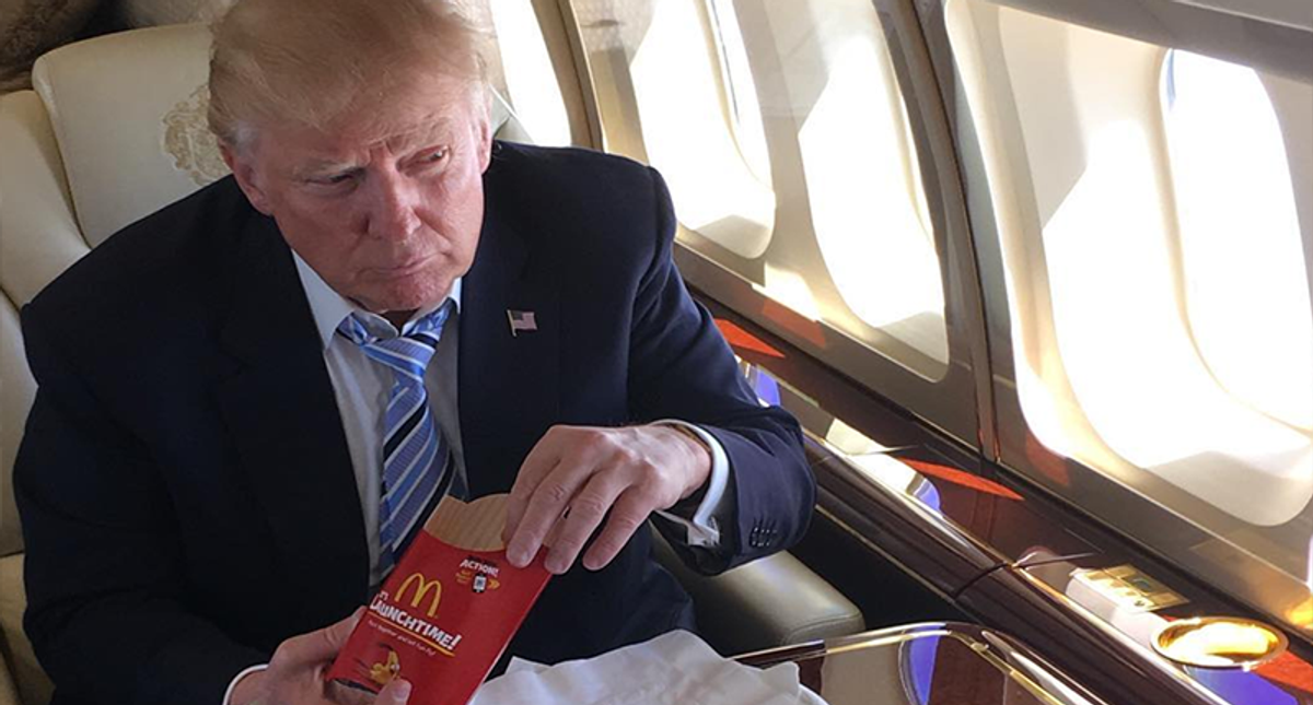 'Senile old man got bronzer on my fries': McDonald's slammed on Yelp over Trump photo-op