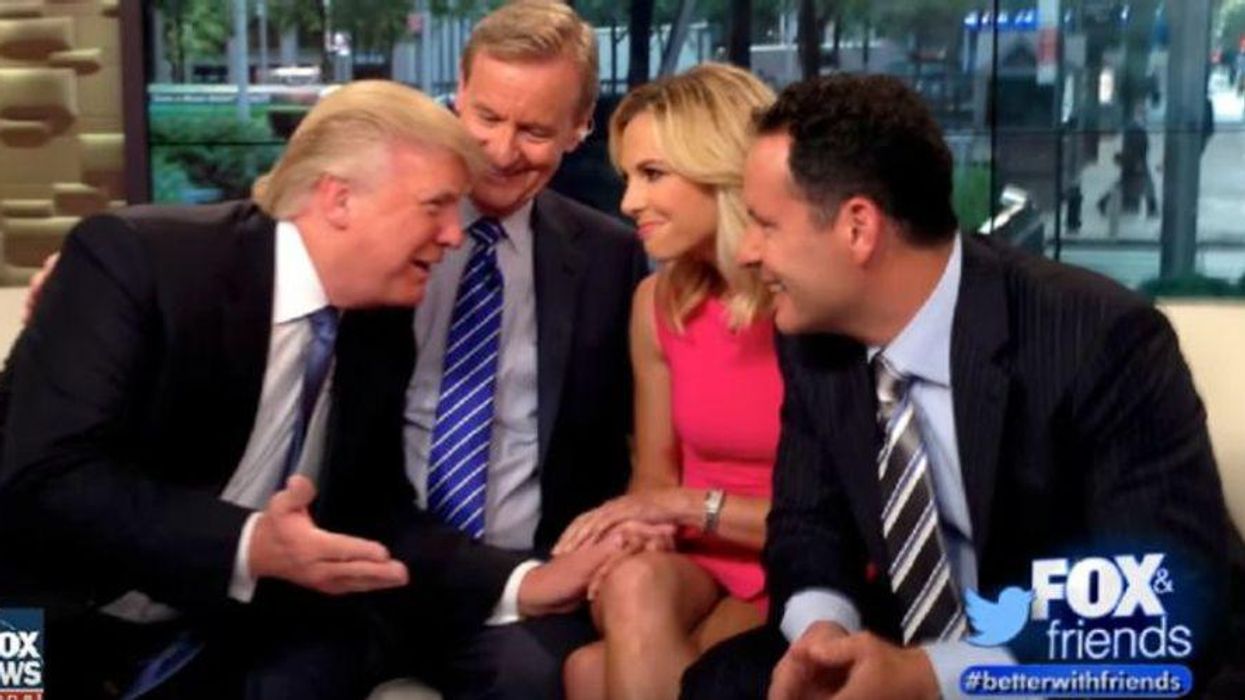 Trump won't encourage vaccines because he doesn't want to help Biden -- and he's afraid of his base: report