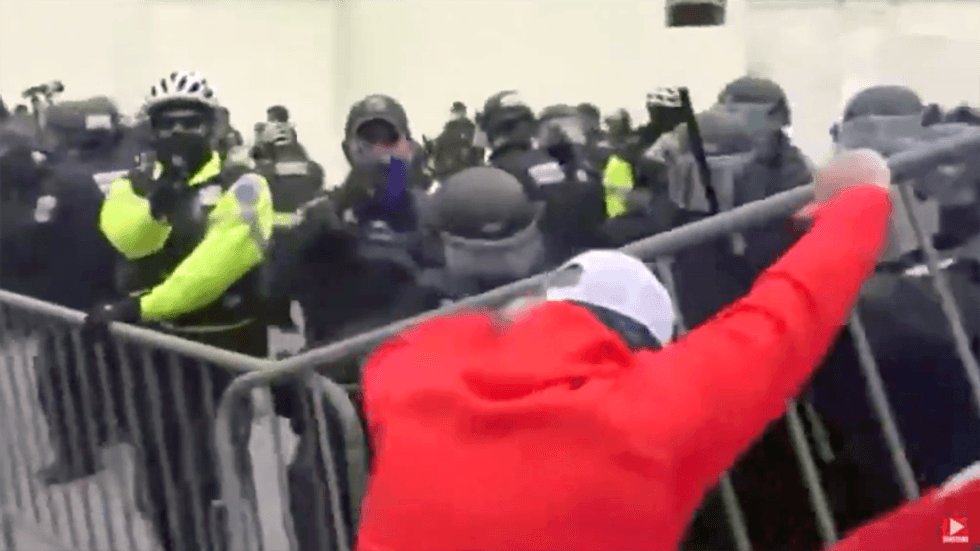 ‘The US Capitol is now on lockdown’: Police bar the doors as Trump supporters storm the building