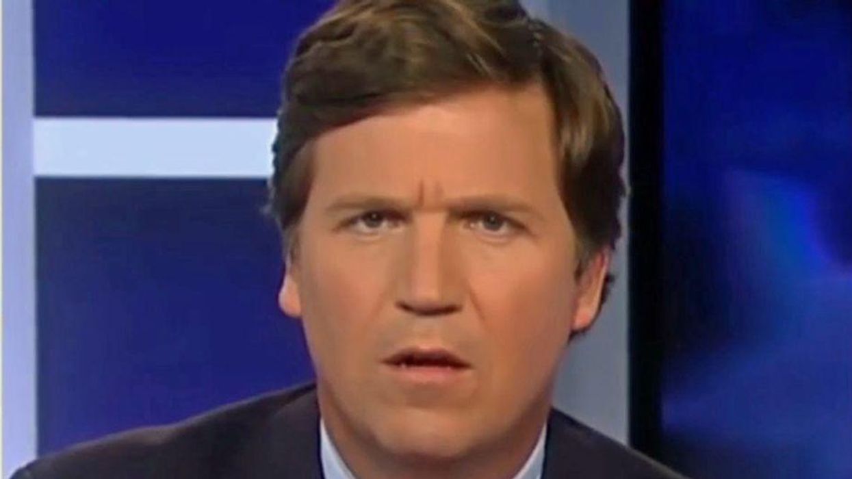 Tucker Carlson's 'red-faced man' conspiracy theory about Capitol rioters just fell apart