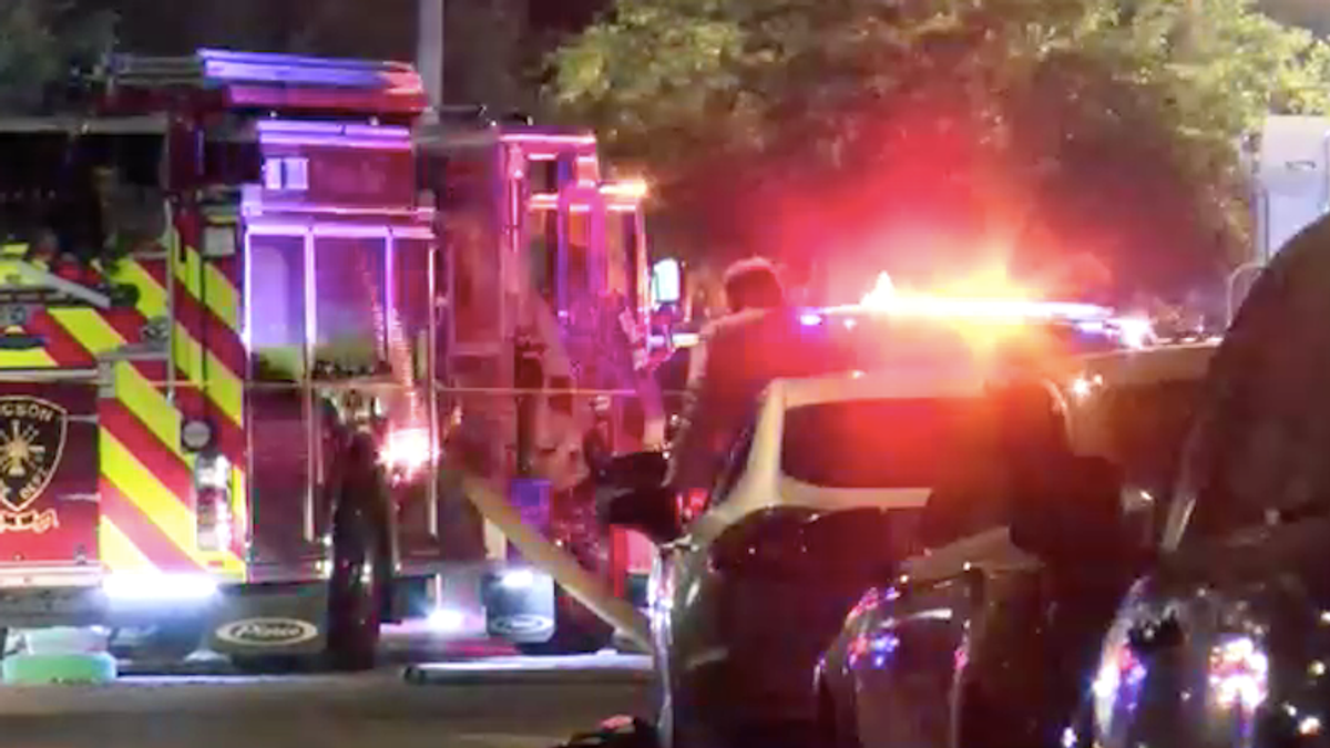 'Horrific' scene as gunman opens fire on emergency crews and neighbors battling house fire